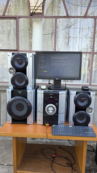 Combina sony rg 444 cu subwoofer si cu un sunet puternic si clar