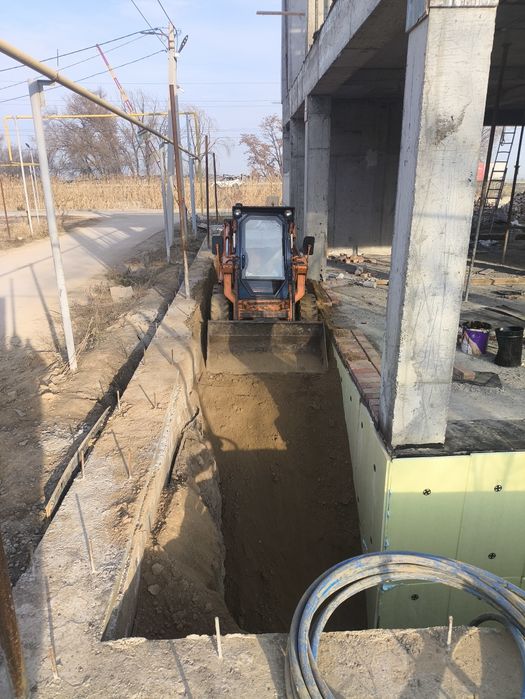 Услуги мини погрузчика.