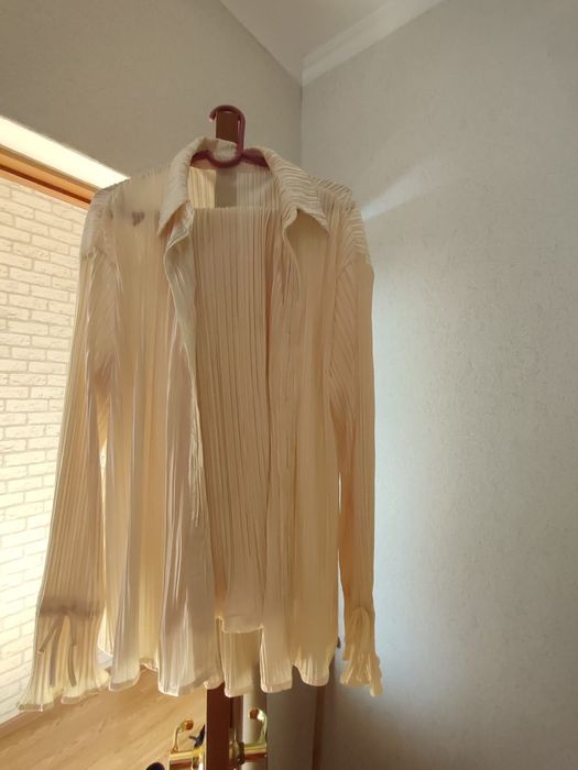 Продам новый костюм