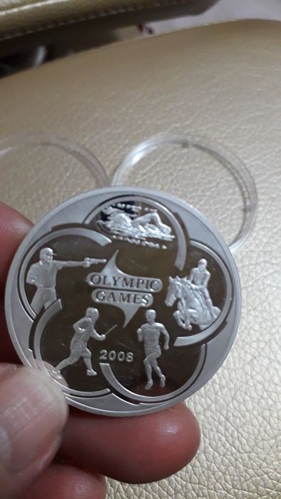 Колекционная манета,күміс