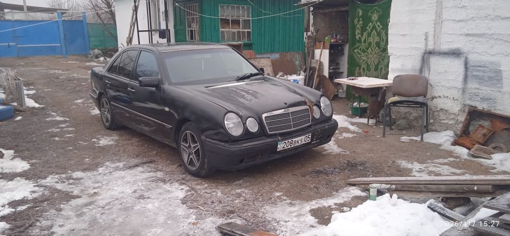 Мерседес 210 бенс