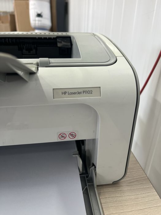 Принтер HP P1102