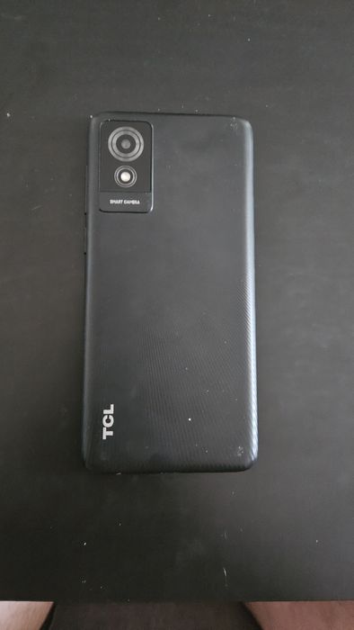 vand telefon TCL 501 32 GB