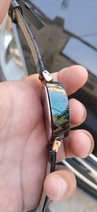 Это — модель Louis Vuitton Tambour LV‑277 Chronograph, где «LV‑277» об