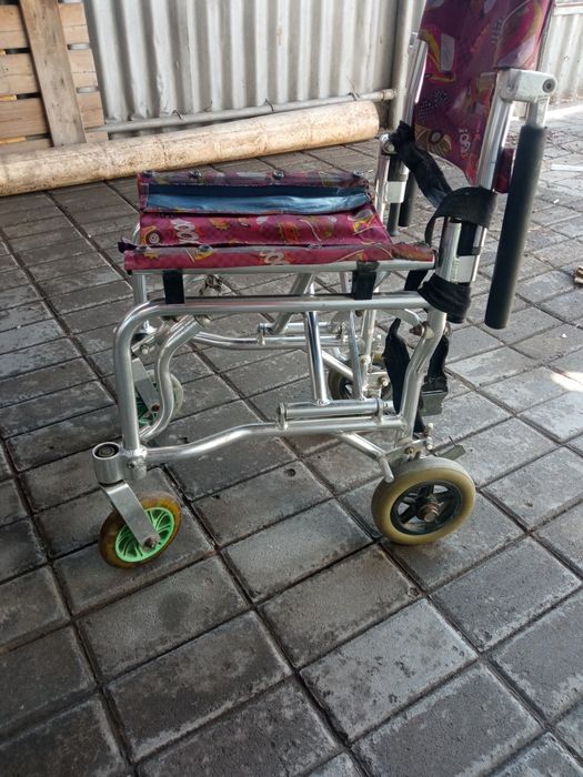 Детская инвалидная коляска