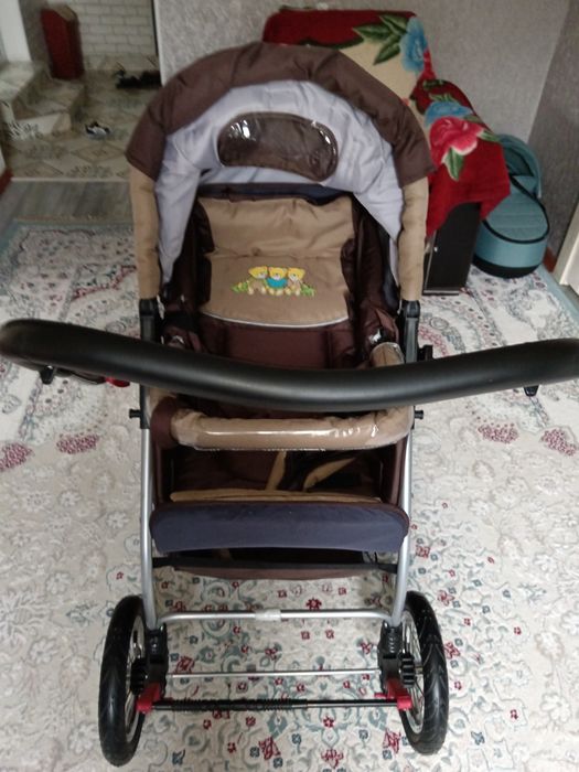 Большая коляска новая