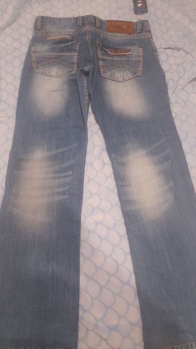 Продам новые джинсы