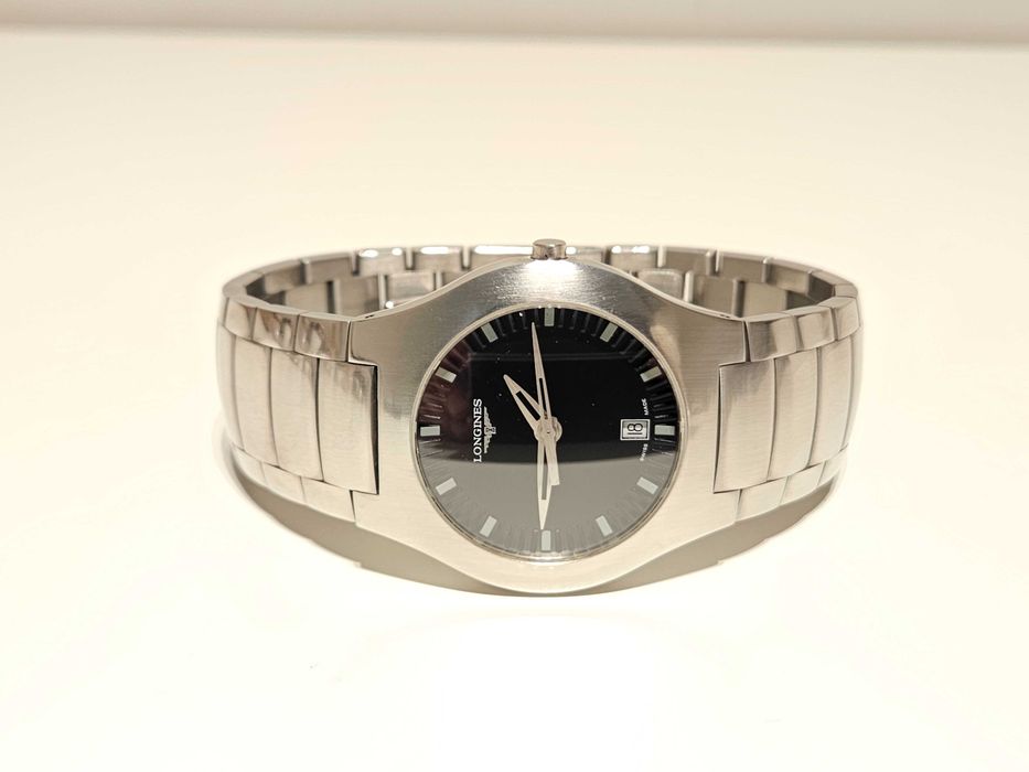Продаван елегантен стомана кварц мъжки  дамски часовник"Longines"