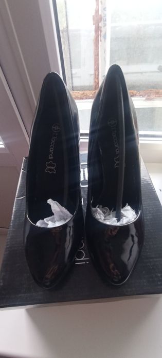 Продам новые туфли