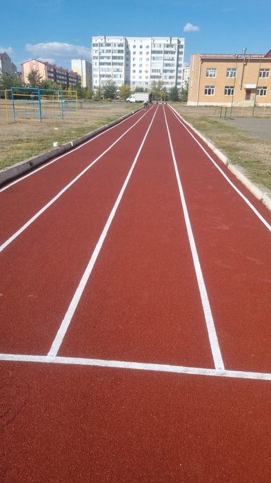 Резиновые покрытие, тартан