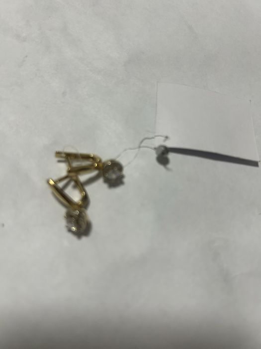 Продам золотые серьги