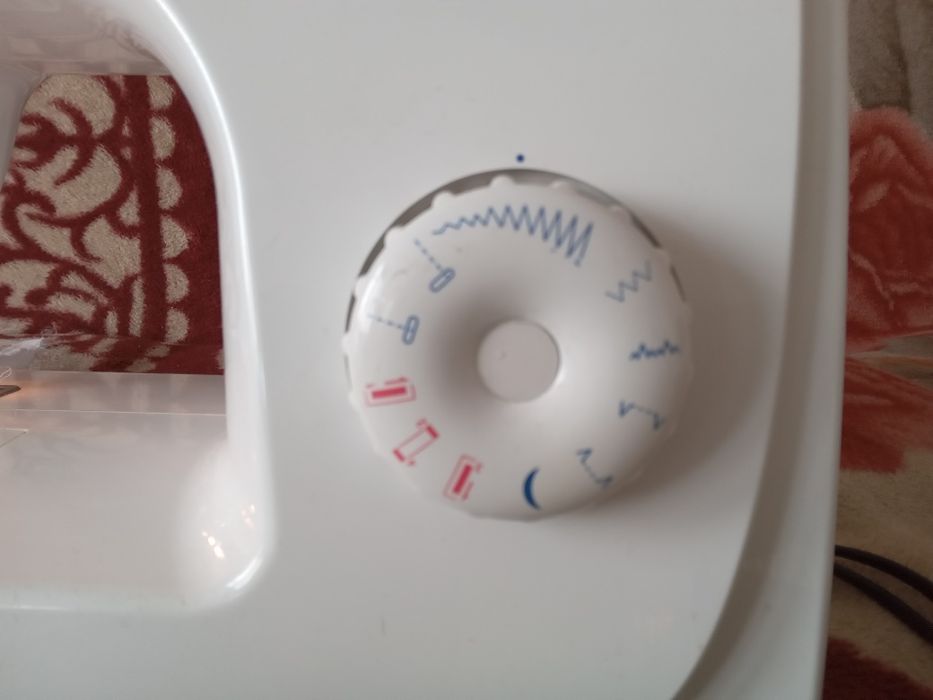 Masina de cusut Singer