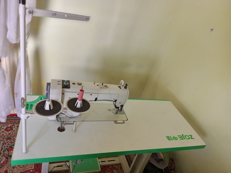 Zoje tikuv moshinasi