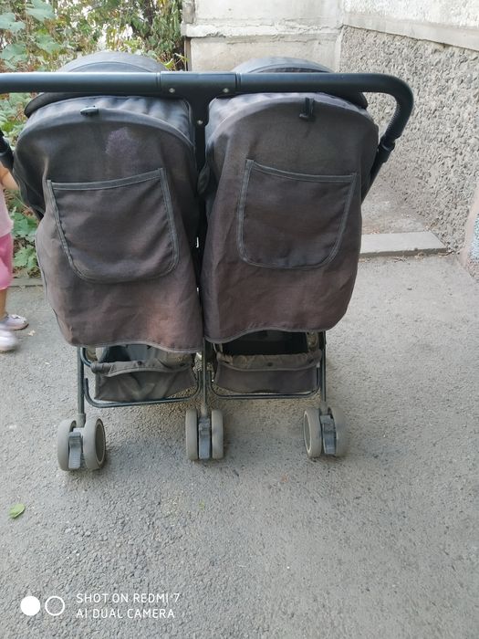 Детская прогулочная коляска для двойни