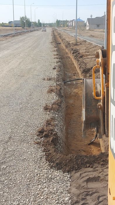 Услуги экскаватора погрузчика