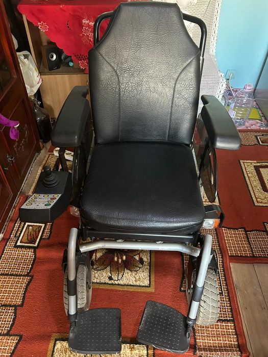 Carucior electric pt persoane cu dizabilitati