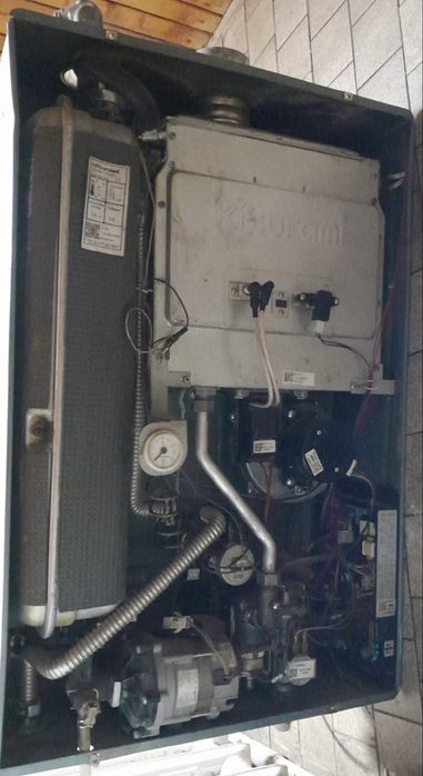 Продам газовый котел Kiturami