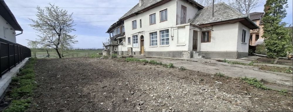 Casa si teren mare cu fantana str Romana