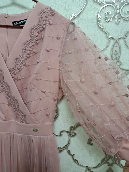 Женская одежда .