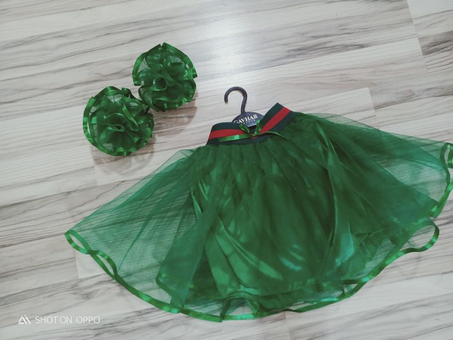 Юбка бантигімен.