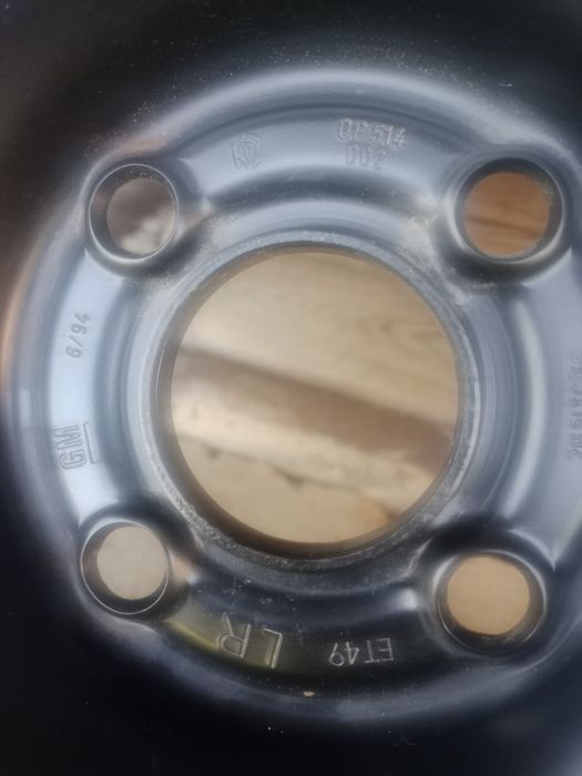 Продам шину с диском на Опель