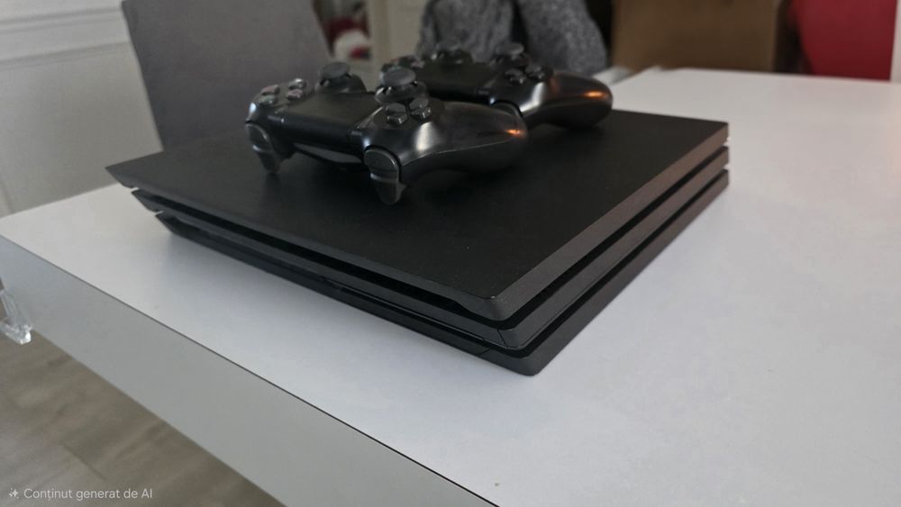PS4 Pro 1TB memorie + 2 controlere si 9 jocuri incluse