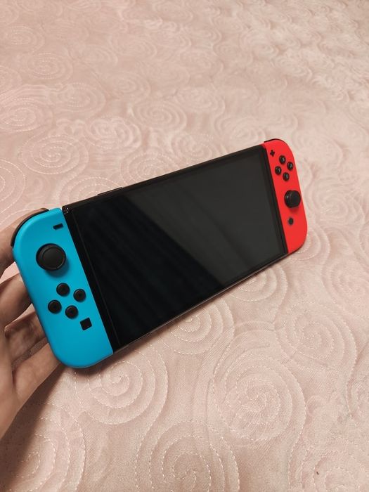 Nintendo switch OLED + Mortal Kombat 1