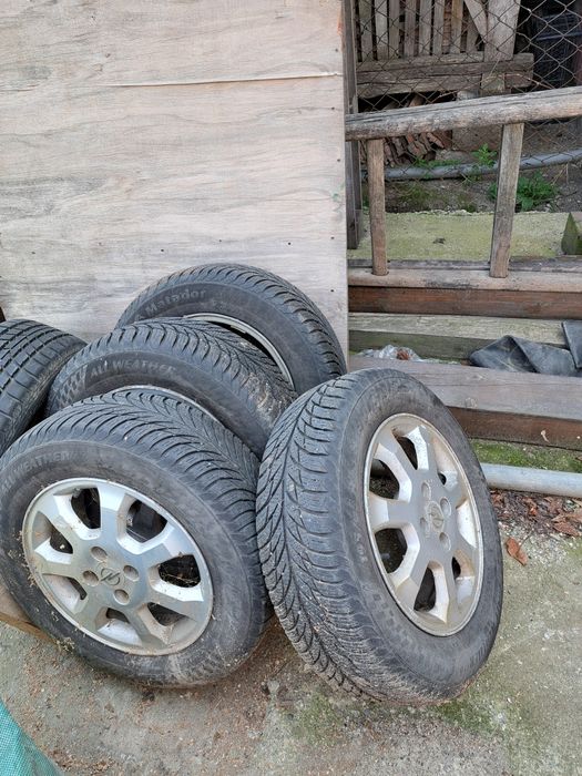Vând jante opel cu anvelope iarna