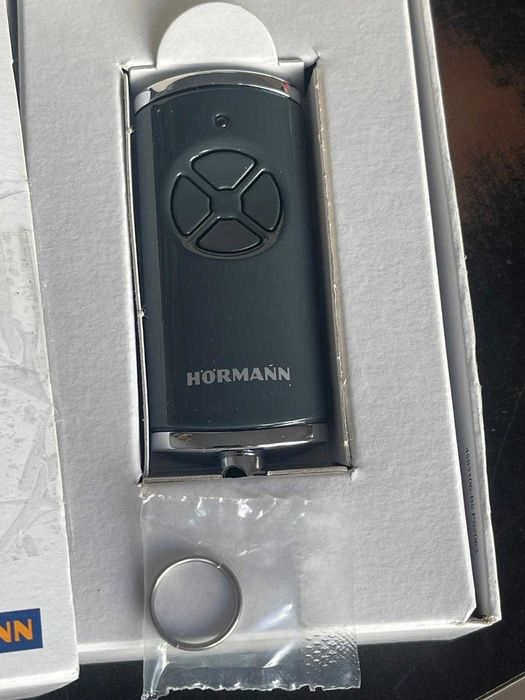 Telecomanda garaj Hörmann HSE 4 BS 4511573 (frecvență 868 MHz, antracit lucios, motor pentru ușa de garaj cu capace cromate))
