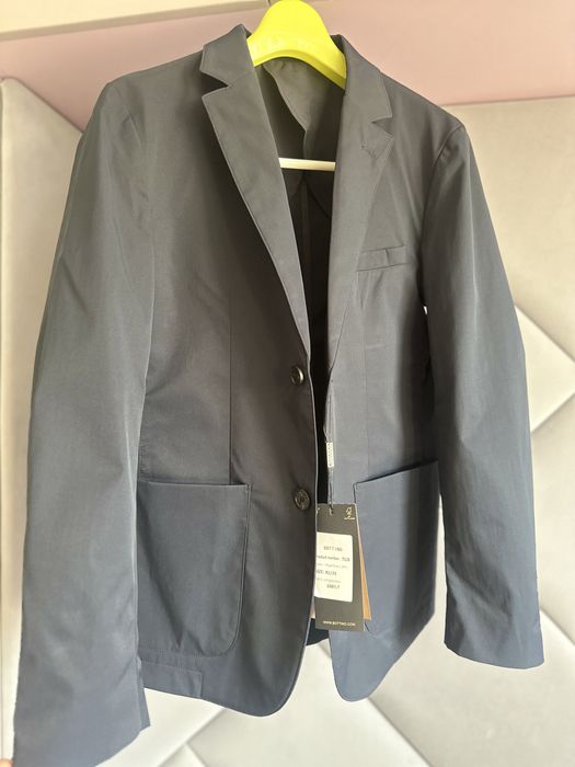 Продам новый пиджак полуклассика