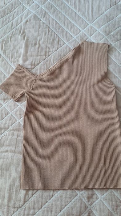 Продам новый женский трикотажный костюм с юбкой