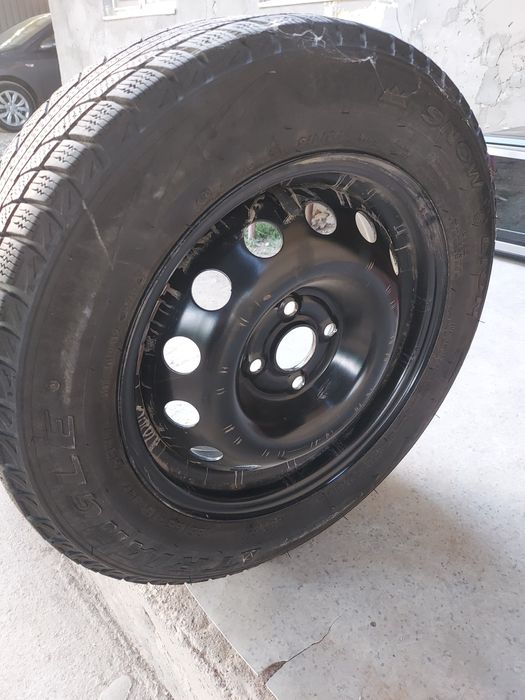 Шины  зимние  трианжело