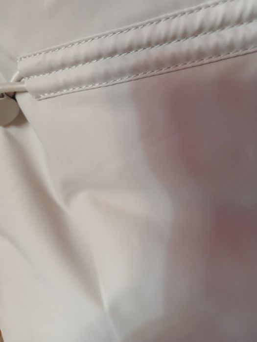 Продам пуховик новый