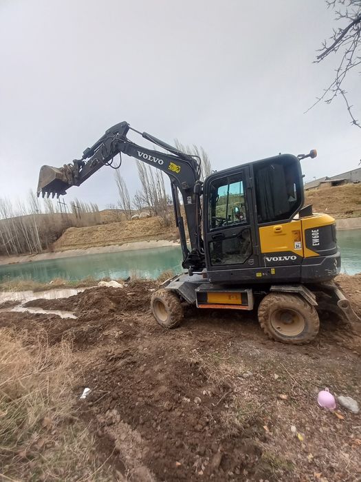 Экскаватор  хизмати