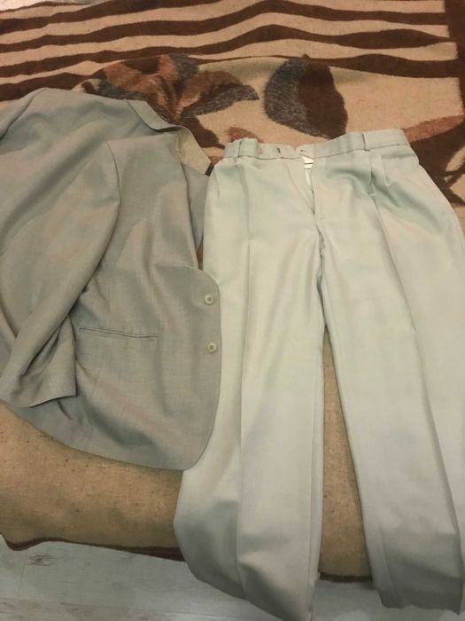 Продавам  костюм - сако и панталон размер 52/176