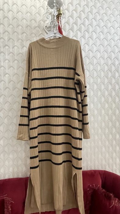 Киімдер сатылады