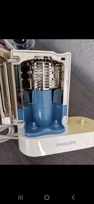 Dus bucal Philips si sterilizator capete periute de dinti