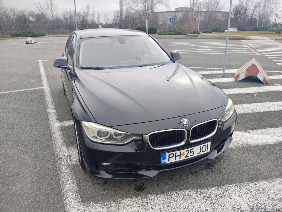 BMW 320i an 2012 184hp