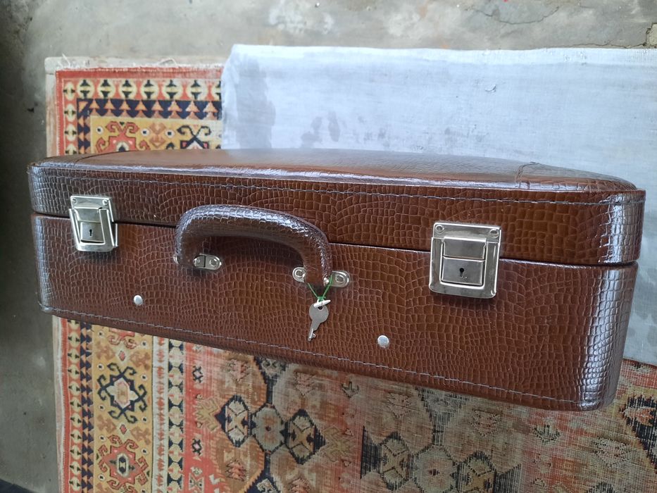 Кожаные чемоданы