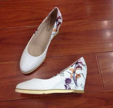 Продам новые кожаные туфли с акцентным каблучком