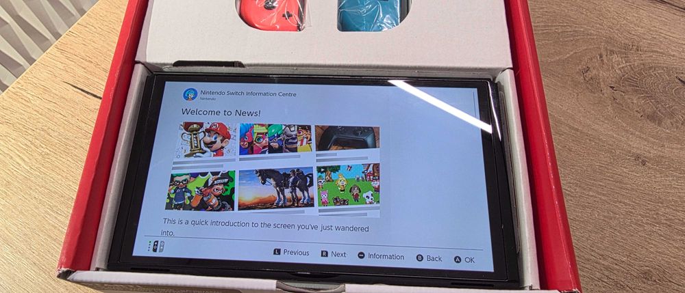 Consola NINTENDO Switch OLED (Neon Red/Blue) + Everybody 1-2-Switch!