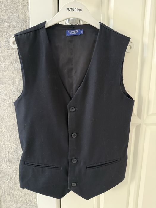 Продам жилет школьнвй синий для мальчика