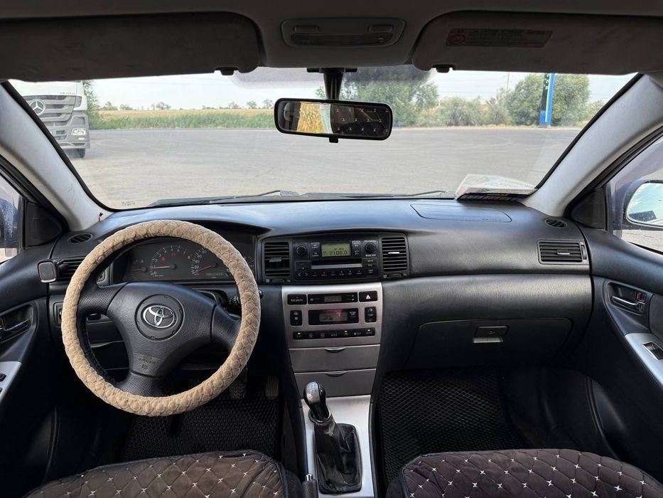 Тойота каролла 2003