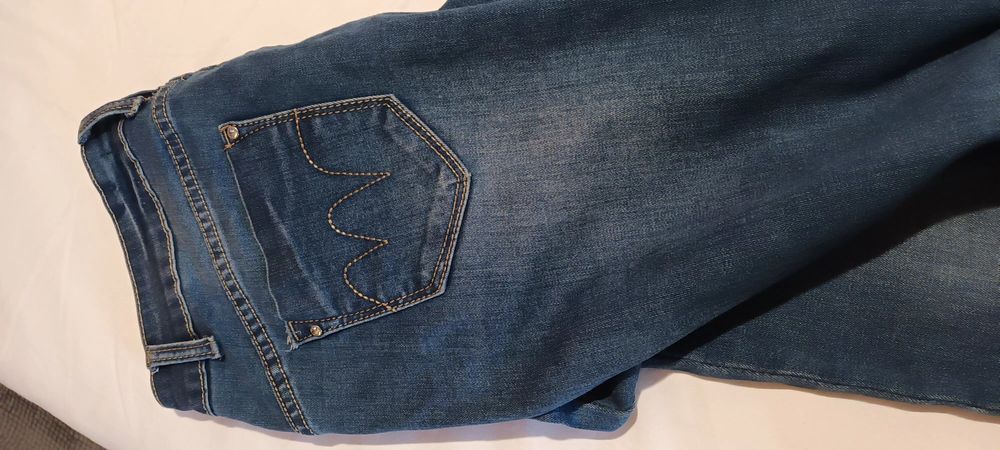 Blugi elastici sckiny sigaretta cu insertii leopard 44-46