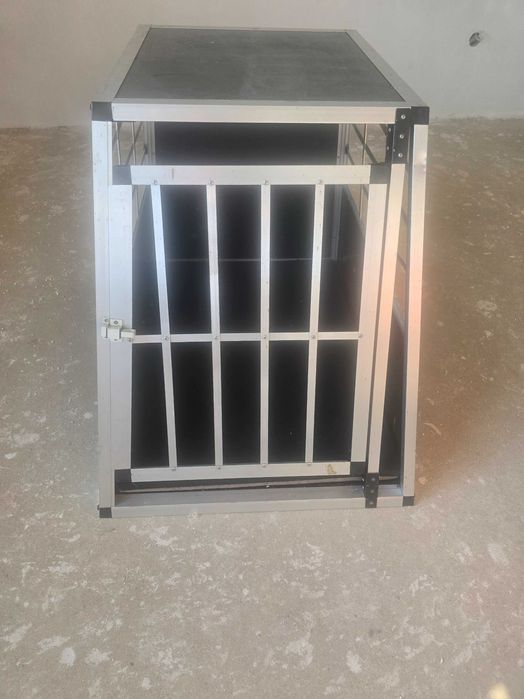 Клетка за транспорт на кучета