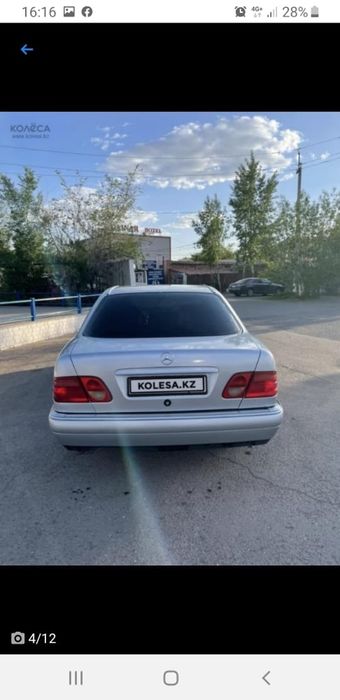 Мерседес 210.