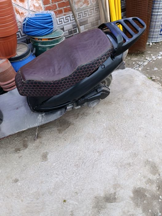 Скутер бензинового