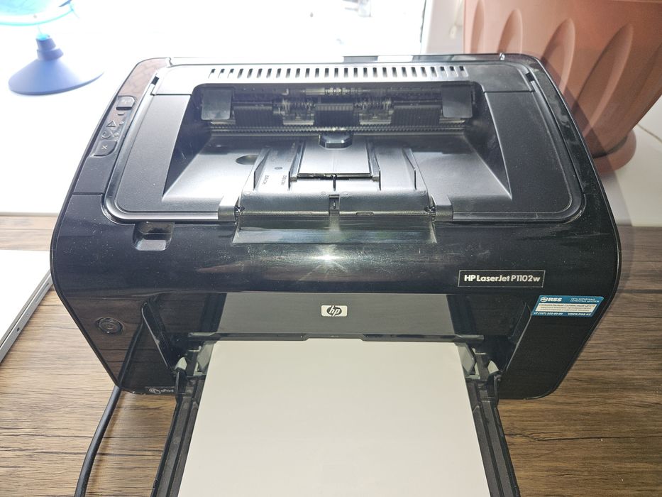 Принтер HP P1102w