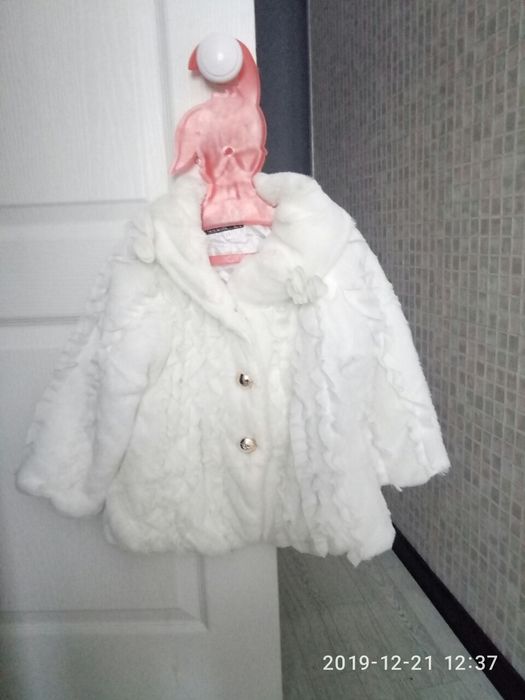 меховая накидка на 5-7 лет.