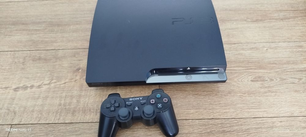 PS3 in stare buna, cu 4 jocuri și o maneta